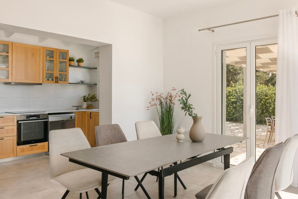 Image depicting the dining area and kitchen